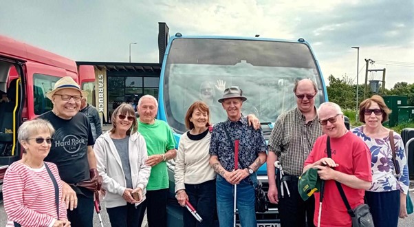 The Skegness Pinbusters Team in front of the minibus on their way to the championship in Sheffield.