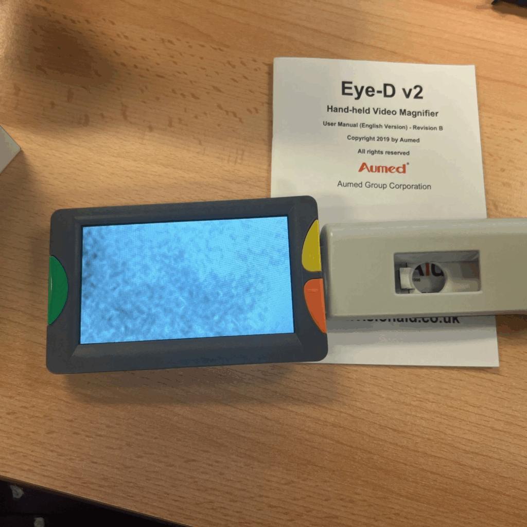 Photo shows the magnifier with instruction booklet.
